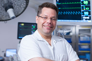 Photo of a doctor. Link to Gifts from Retirement Plans.
