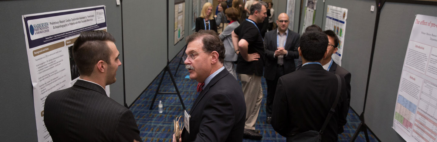 Photo of two men talking